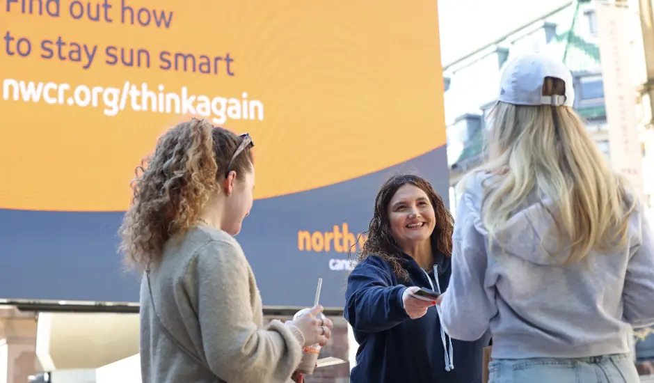 CHARITY WORKER OUT IN THE COMMUNITY 